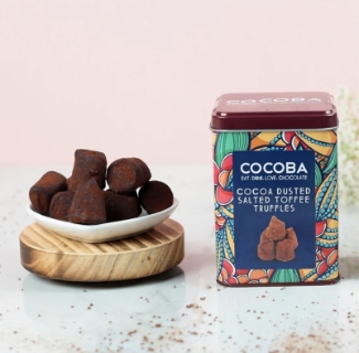 Cocoa dusted salted toffee truffles in a beautifully printed Cocoba tin to make for the perfect gift. 