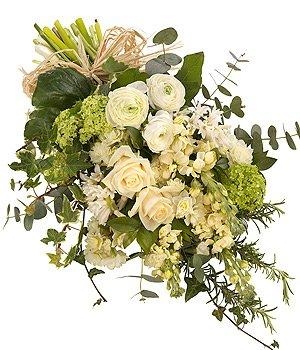Natural flat funeral spray with roses, stocks and chrysanthemum. 
