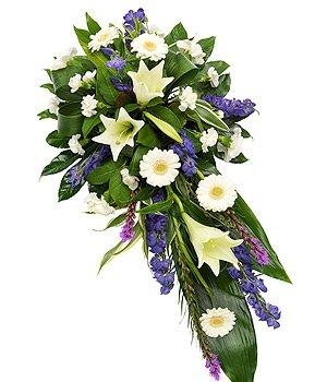 Purple and white single ended funeral spray including roses, lily and liatris. 