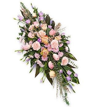 Beautiful double ended casket spray in pink and mauve tones creating a very delicate design. 