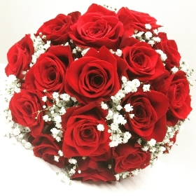 Luxury red rose and white gypsophila bridal bouquet. 