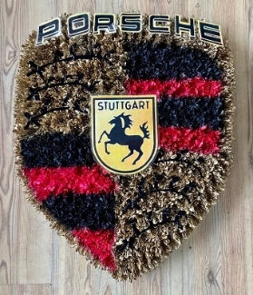 Porsche Badge funeral tribute created with sprayed chrysanthemum and printed details. 