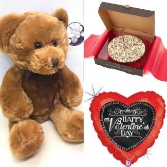 A 'bundle of love' Including a cuddly teddy, chocolate pizza and helium balloon. 